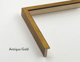 A modern picture frame in an antique gold colour for Butler Gallery’s fine art prints. A close up of one corner, cut off from the rest of the frame showing the depth and width of the frame.