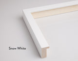 A modern picture frame in a snow white colour for Butler Gallery’s fine art prints. A close up of one corner, cut off from the rest of the frame showing the depth and width of the frame.